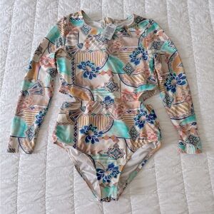 Girls one pice bathing suit with cut outs